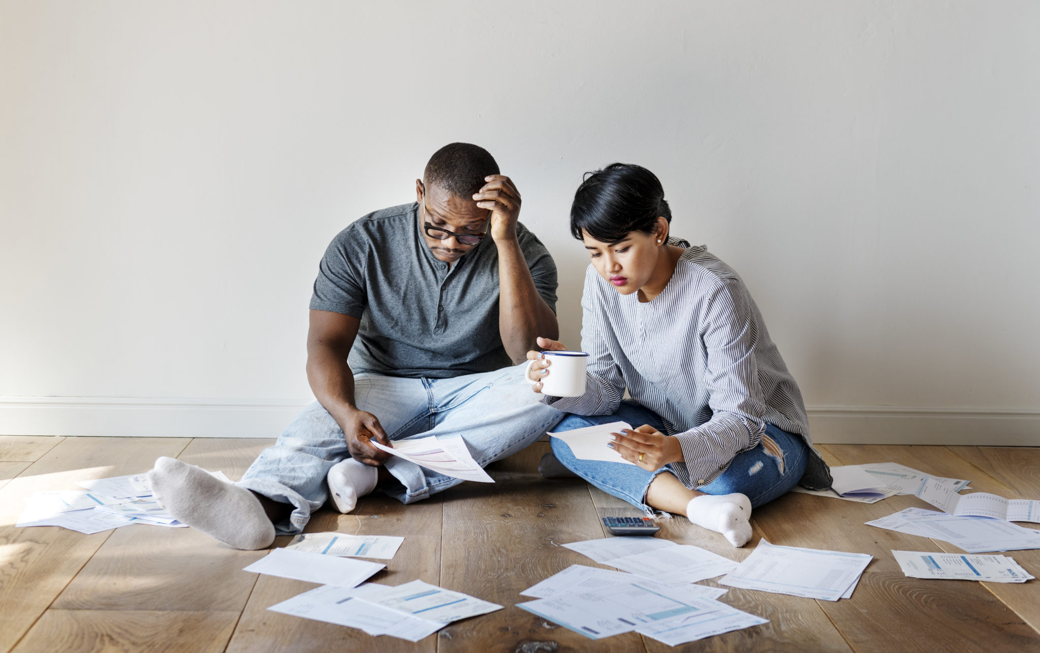 Couple managing the debt Image